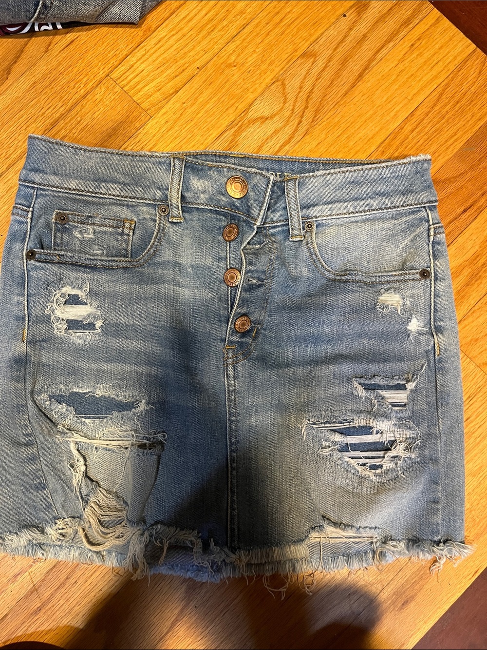 American Eagle Outfitters Light Blue Distressed Denim Mini Skirt